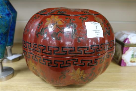 A Chinese lacquer pumpkin shaped box and cover